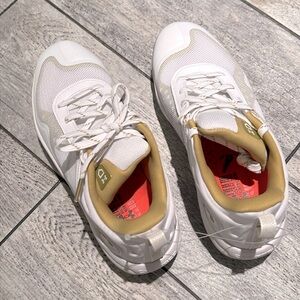 Under Armour womens glyde softball, cleats, 
Microtips, traction.